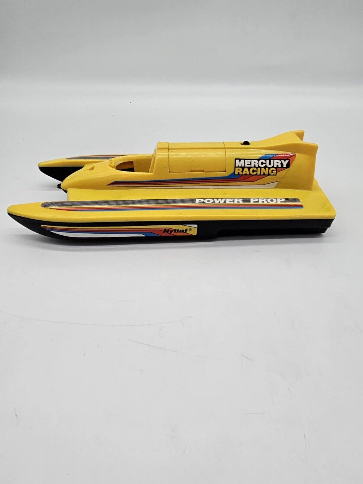 Vintage Tomy Mini Speed Boat TORNADO Catamaran 75 Champion Spark Plug Sticker