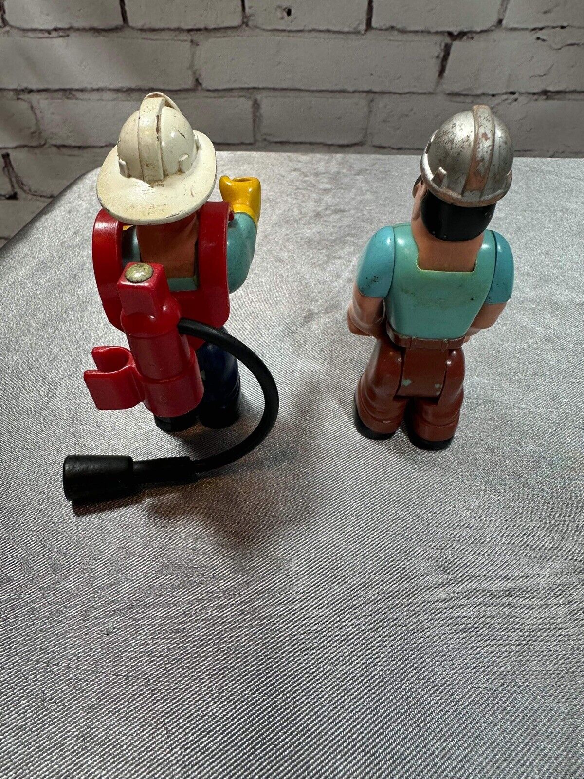 Vintage 1977 Fisher Price Husky Helpers firefighter  construction worker figures