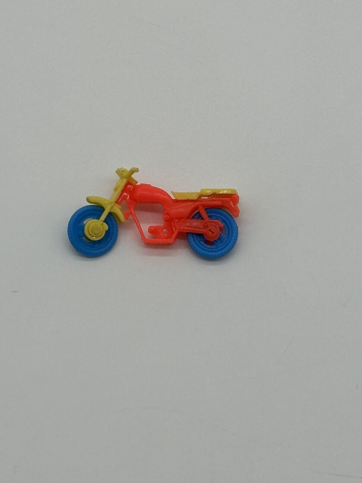 Vintage Red Plastic Motorcycle Toy Blue Moving Wheels