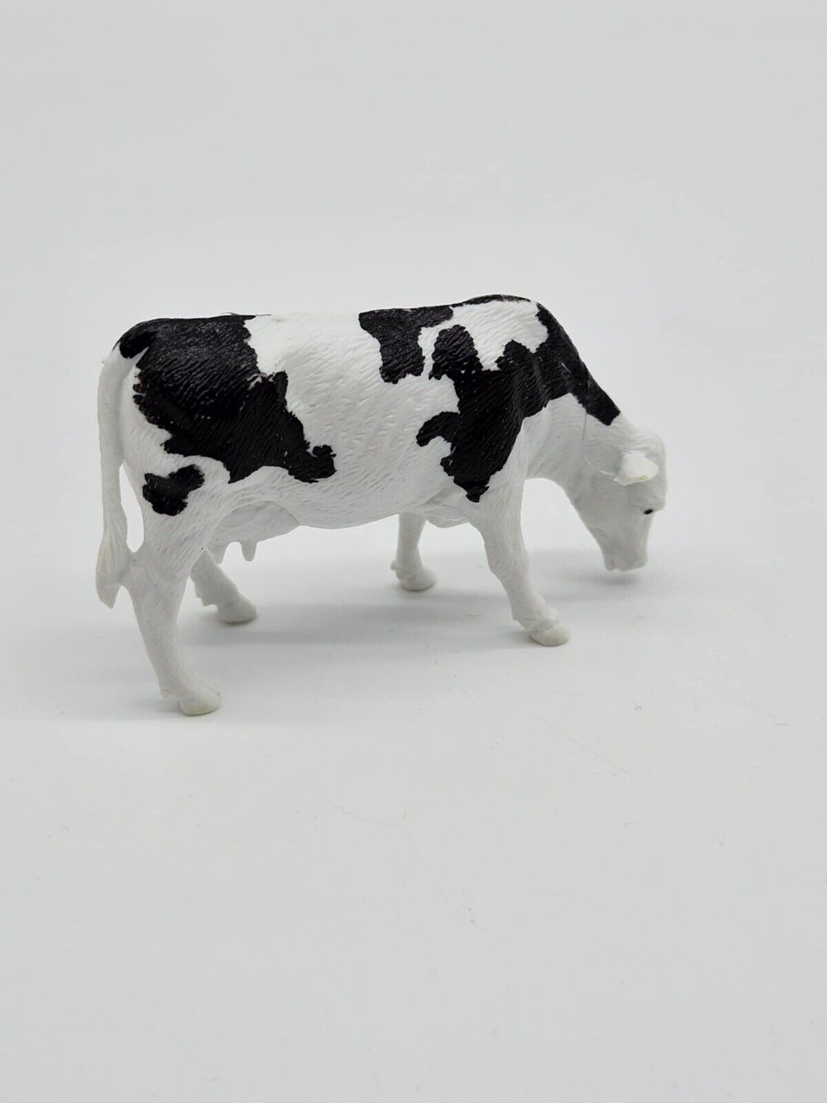 Small Plastic Toy Cow
