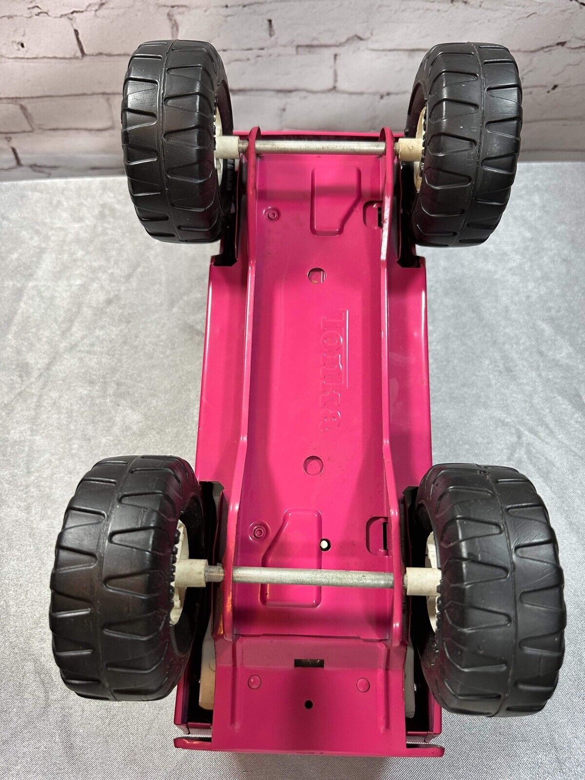 Tonka Stump Jumper lifted Jeepster pink w/white top nice shape vintage