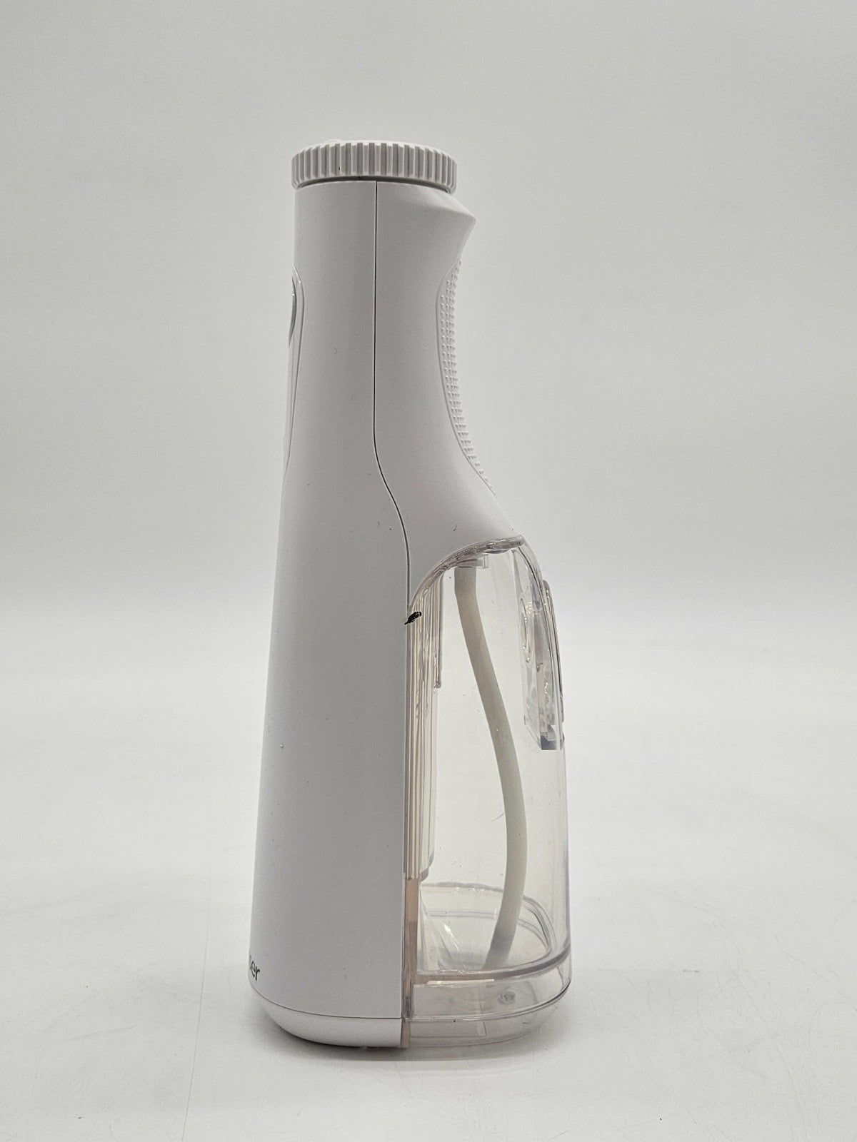 Waterpik Cordless Water Flosser White w Tips Charger Travel Bag Preowned