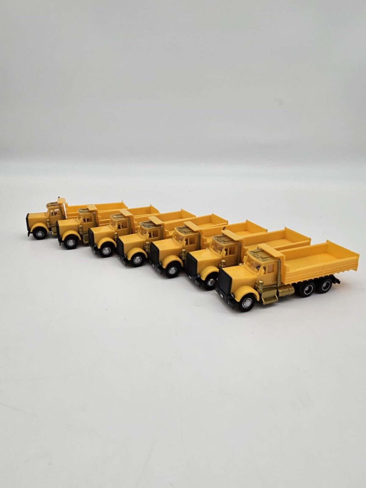 Lot of 7 Plastic Yellow Toy Dump Trucks Party Favor Cake Topper