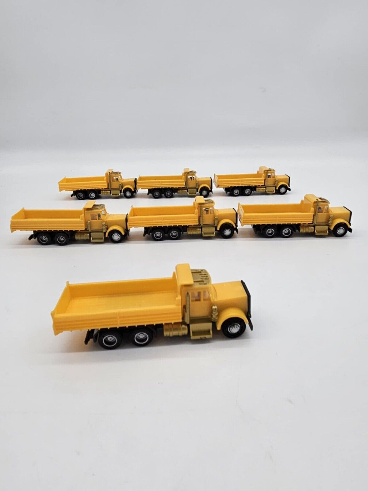 Lot of 7 Plastic Yellow Toy Dump Trucks Party Favor Cake Topper