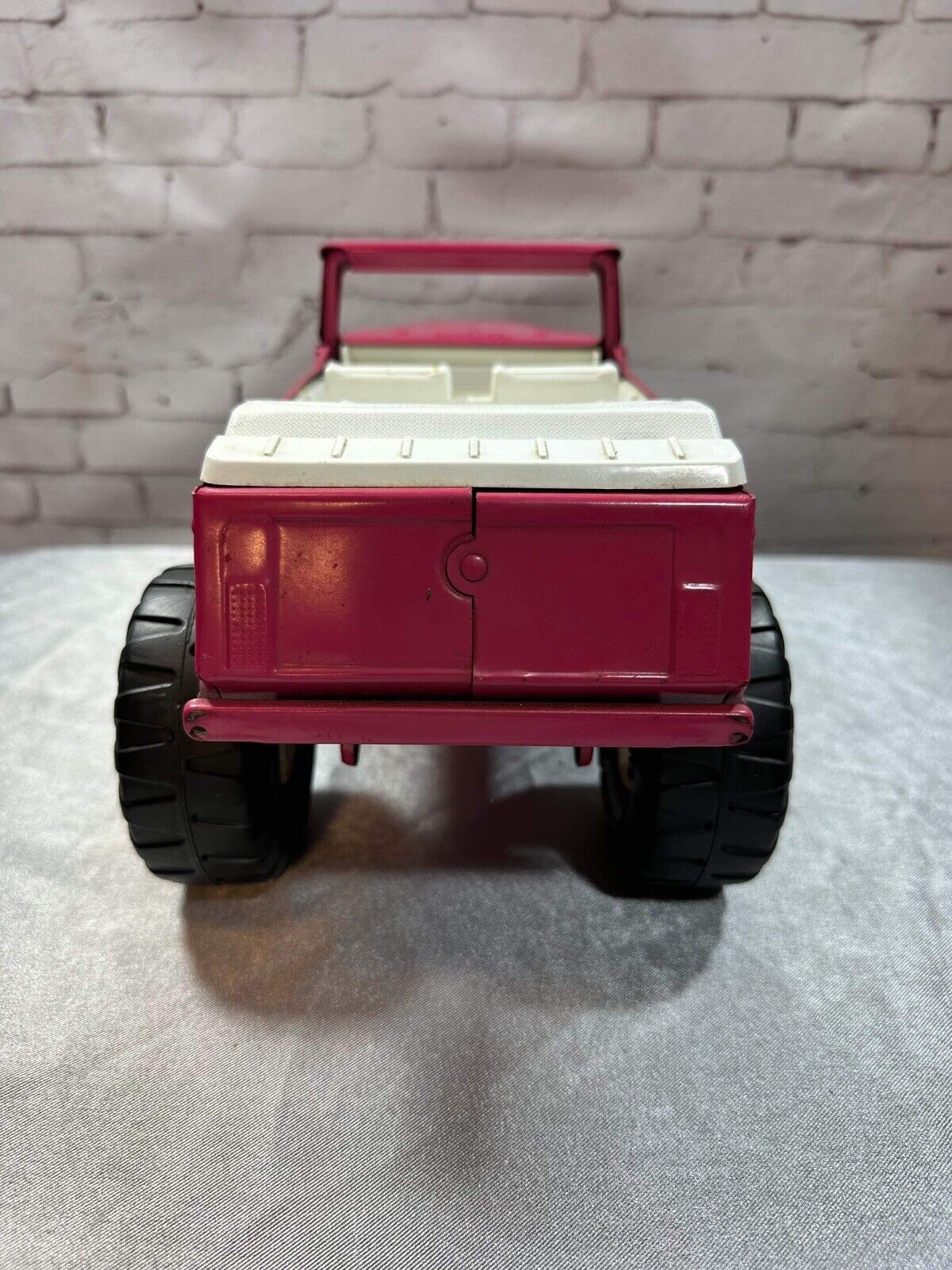 Tonka Stump Jumper lifted Jeepster pink w/white top nice shape vintage