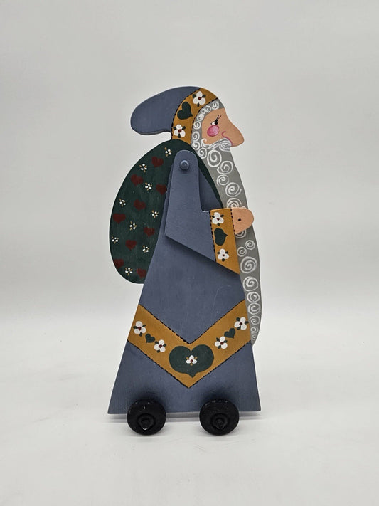 Title: Vintage Wooden Santa Claus Pull Toy on Wheels Folk Art Decor