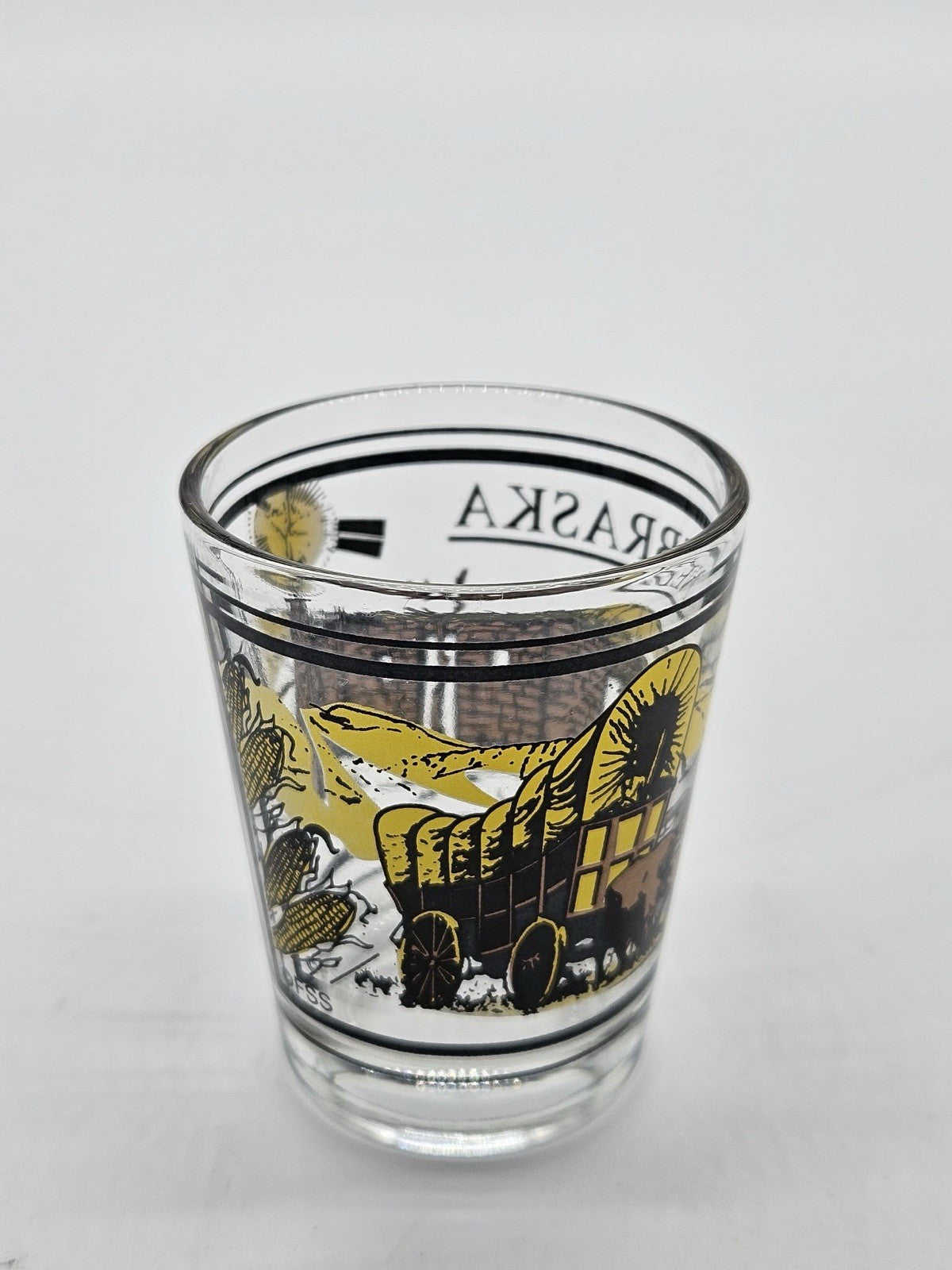 Nebraska Covered Wagon Wheat Corn Rising Sun Scene On Clear Standard Shot Glass