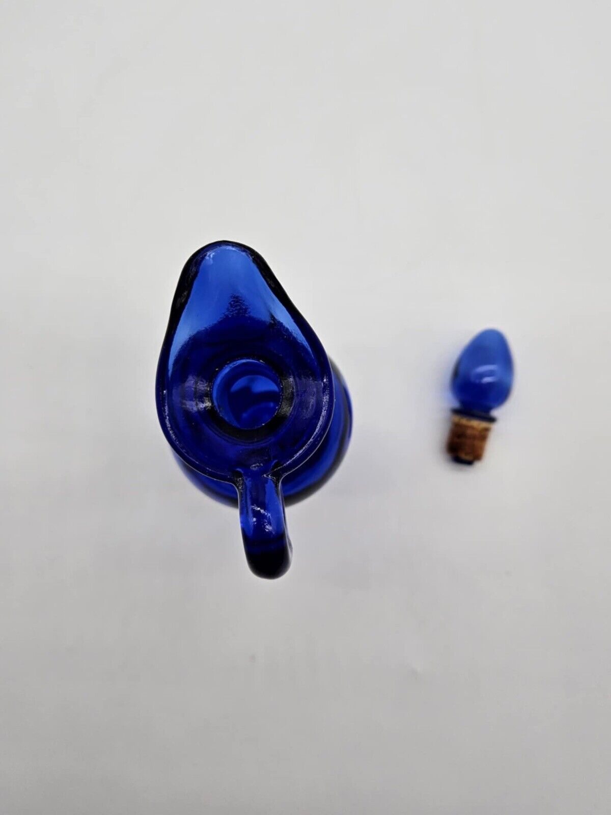Vintage Avon Bottle With Plugs & Gold Ornament Made of Glass Cobalt Blue # 10