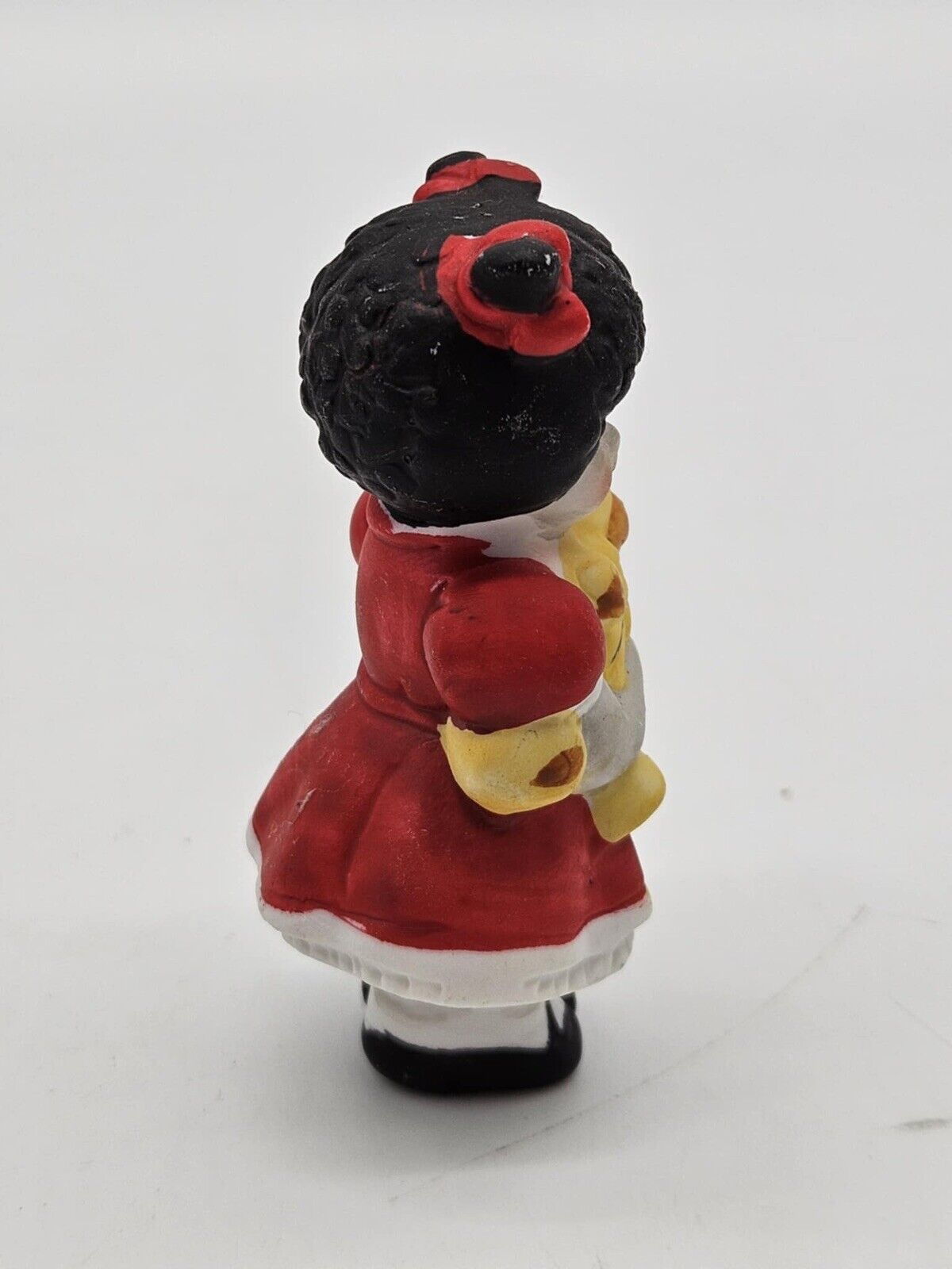 VINTAGE HAND PAINTED BISQUE GIRL HOLDING A TEDDY BEAR 3” ORNAMENT  (CB2985)