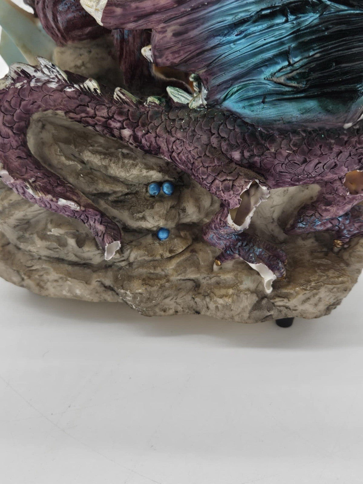 Green and Purple/Red Dragons Fighting over Lighted Orb of Power