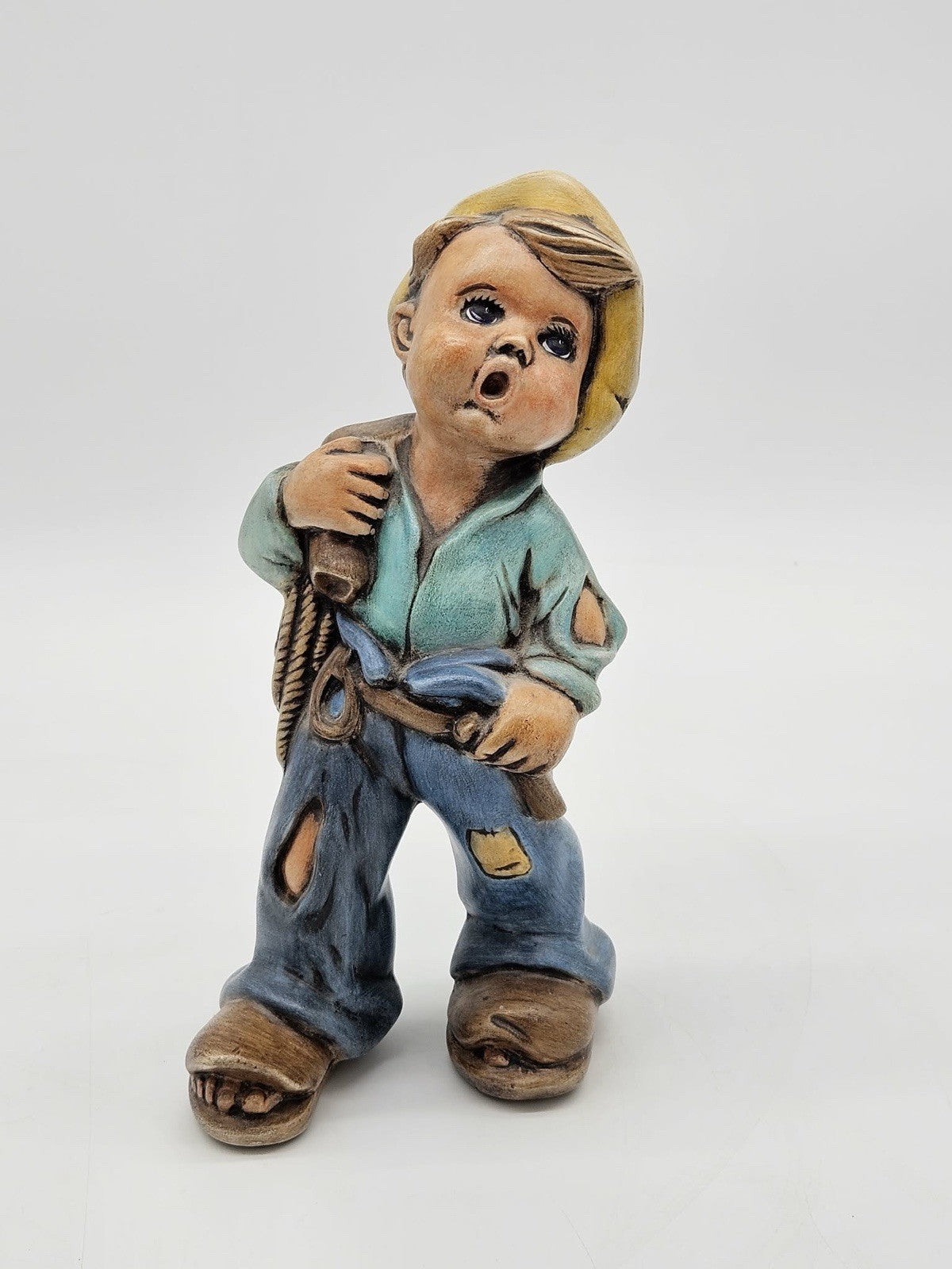 Vintage Hummel Style Boy Figurine with Sack & Ripped Pants