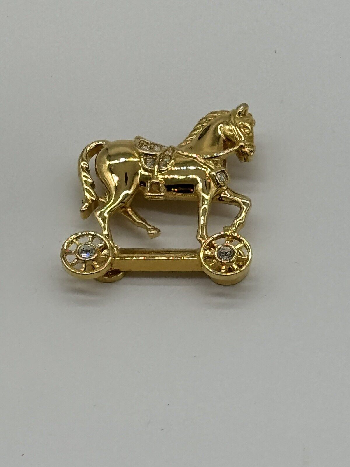 Avon Smithsonian Horse On Wheels Brooch With  Rhinestones Gold Rhodium Plated