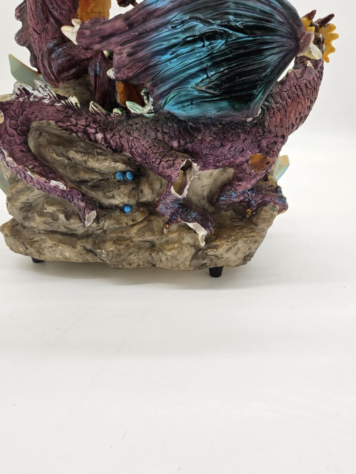 Green and Purple/Red Dragons Fighting over Lighted Orb of Power