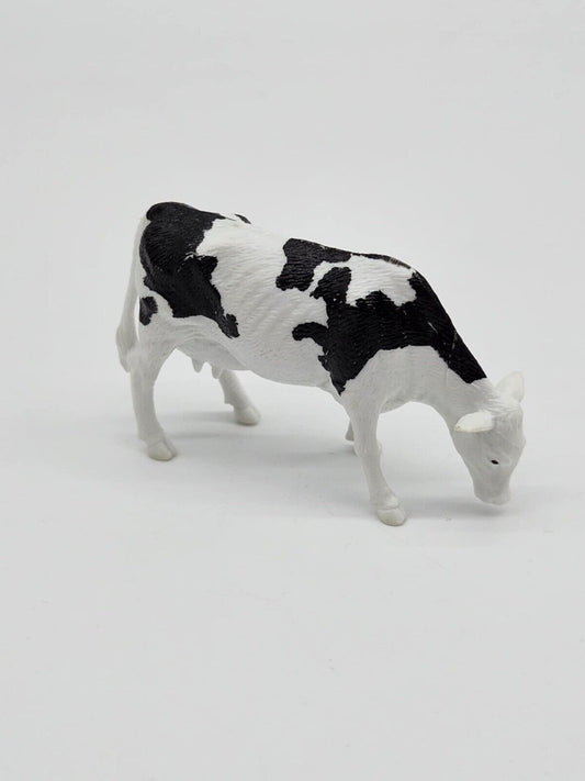 Small Plastic Toy Cow