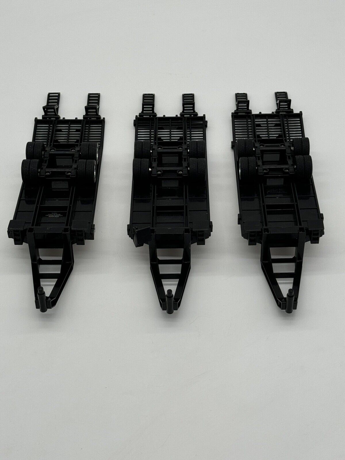 Lot Of 3 Tomy/Ertl Toys 11” Plastic Skid Steer Flatbed Gooseneck Trailer W/Ramps