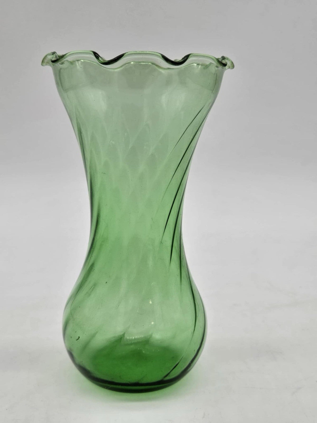 Vintage Glass Swirl Vase With A Green Tint